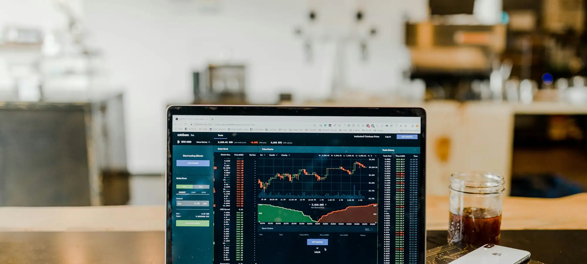 Investment charts on a laptop screen
