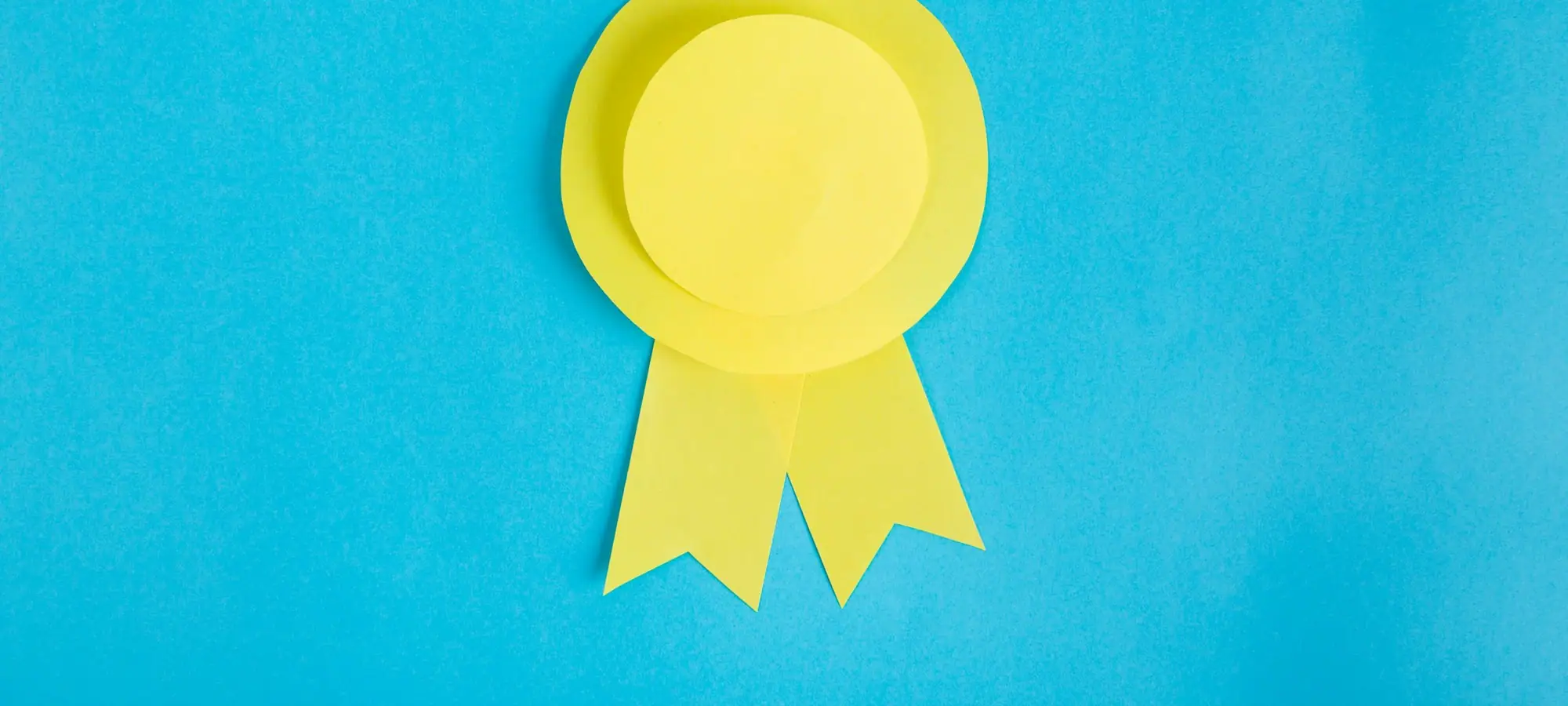 Award ribbon on a blue background