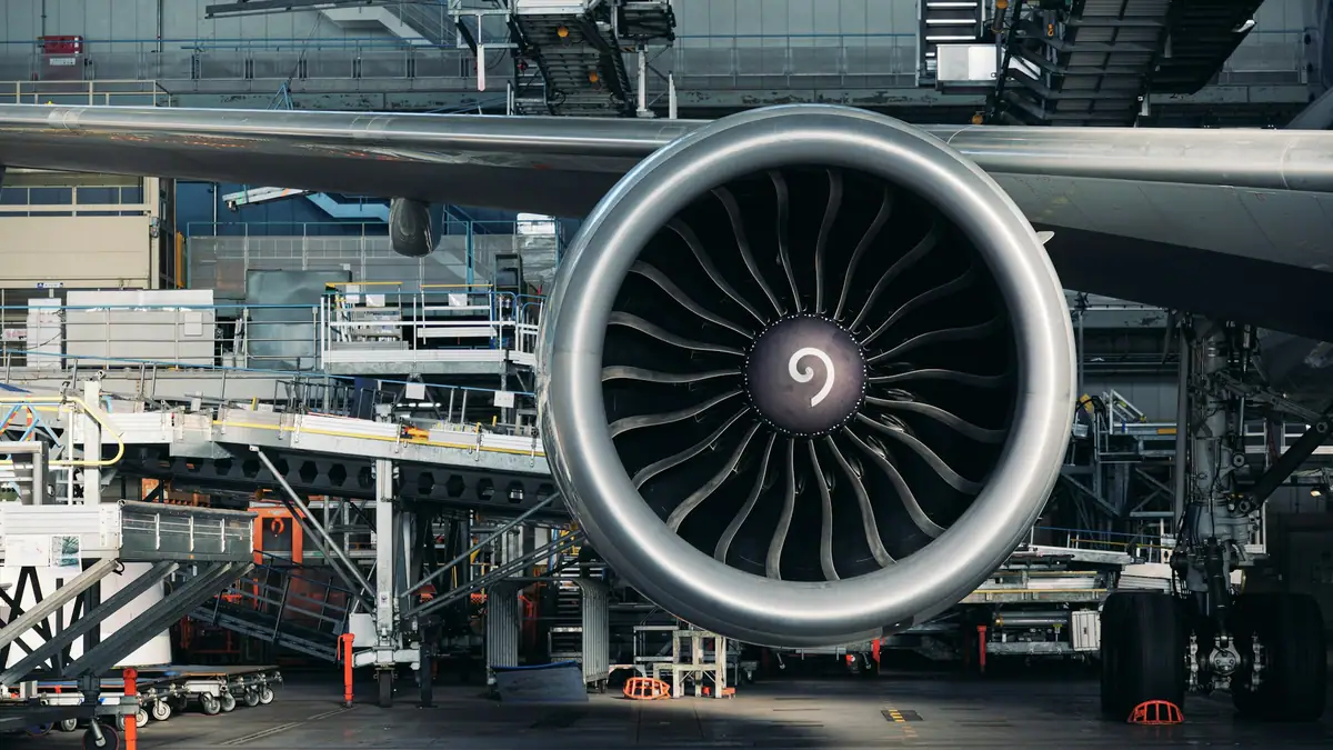 Jet engine under maintenance in an aircraft hangar