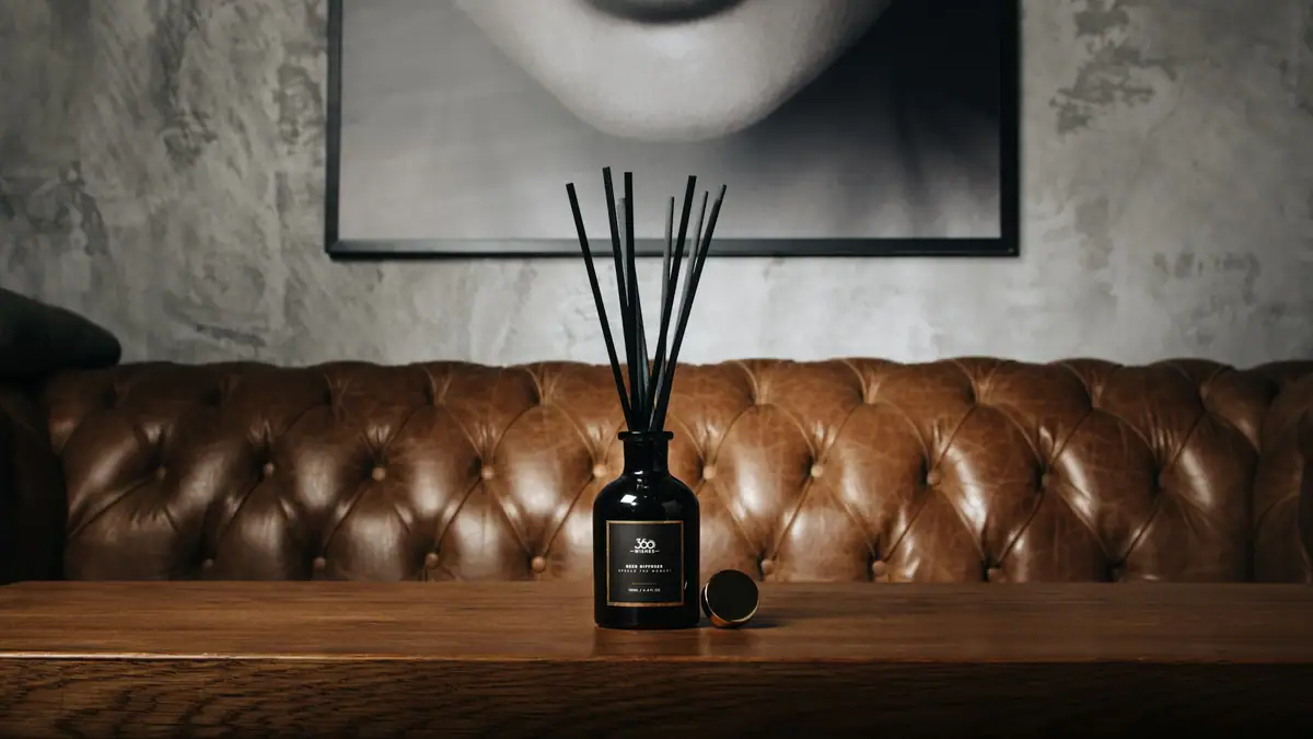 Reed diffuser on a table in a hotel lounge
