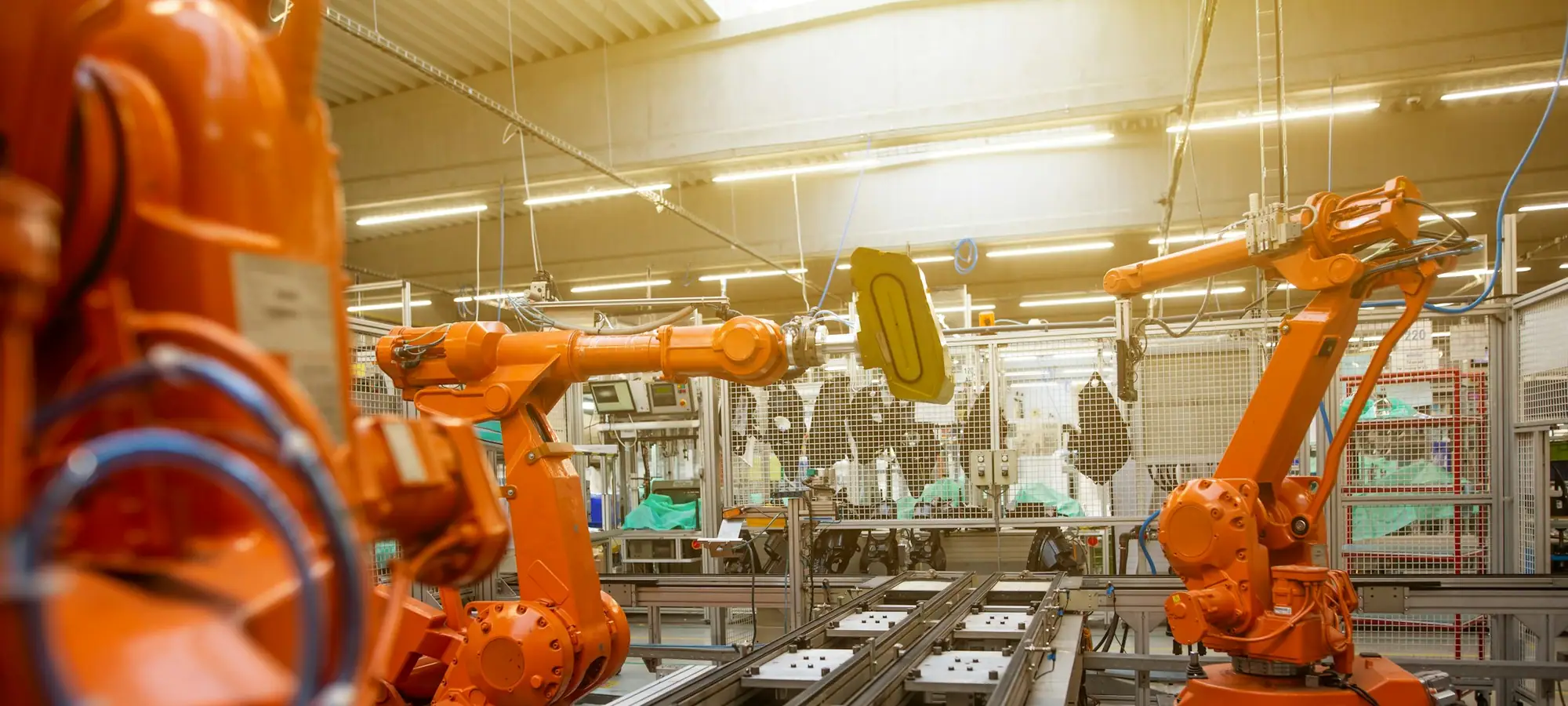 Robotic arms on an automated manufacturing line