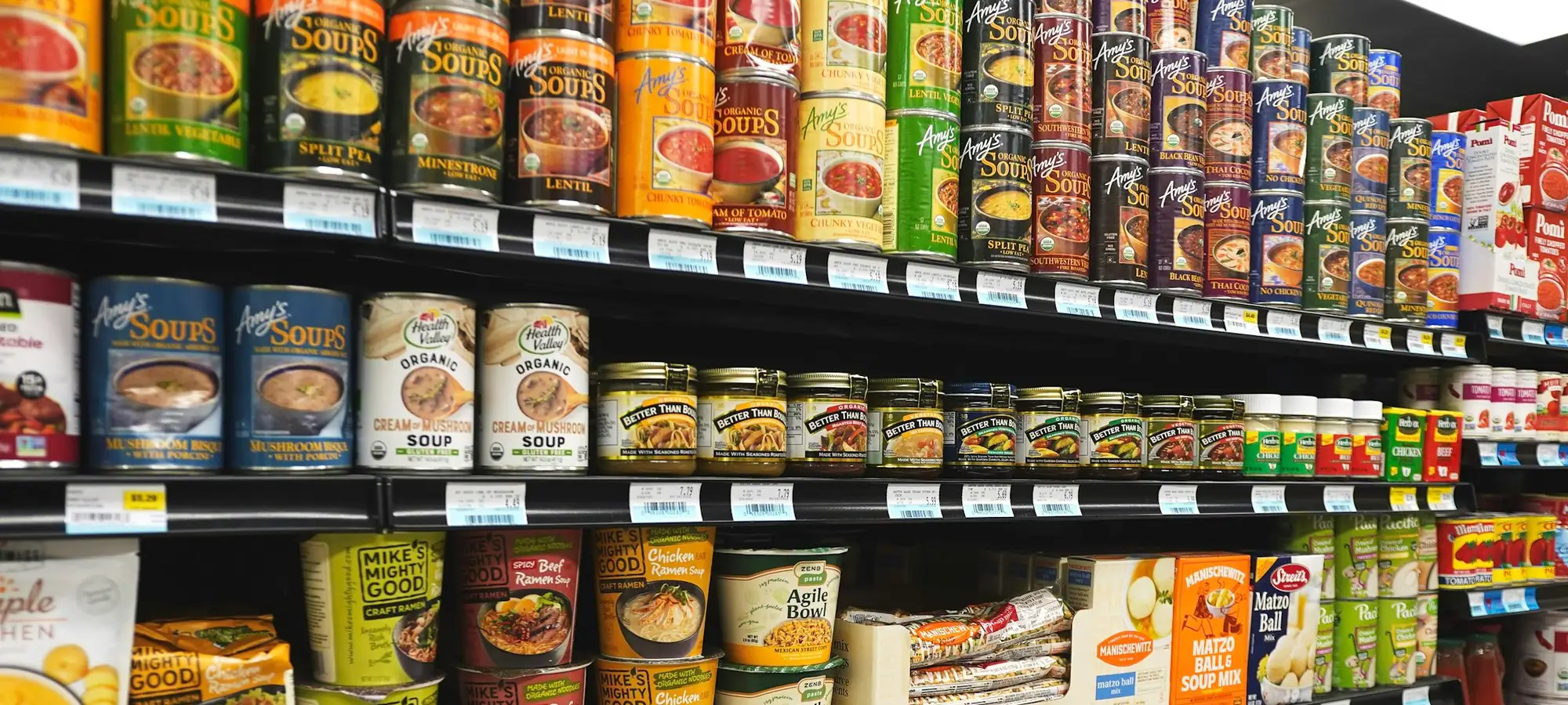 Grocery store shelves stocked with packaged goods