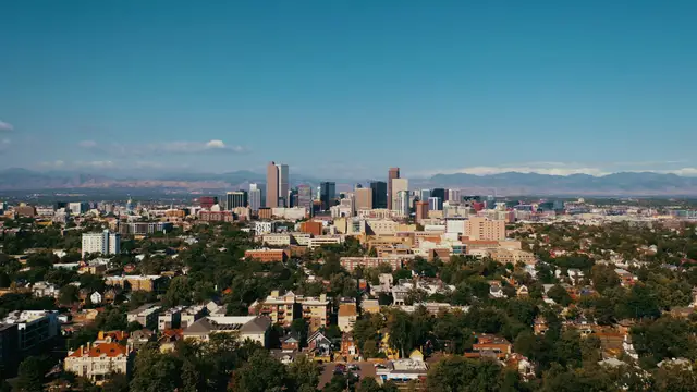 Denver skyline with the Rocky Mountains behind
