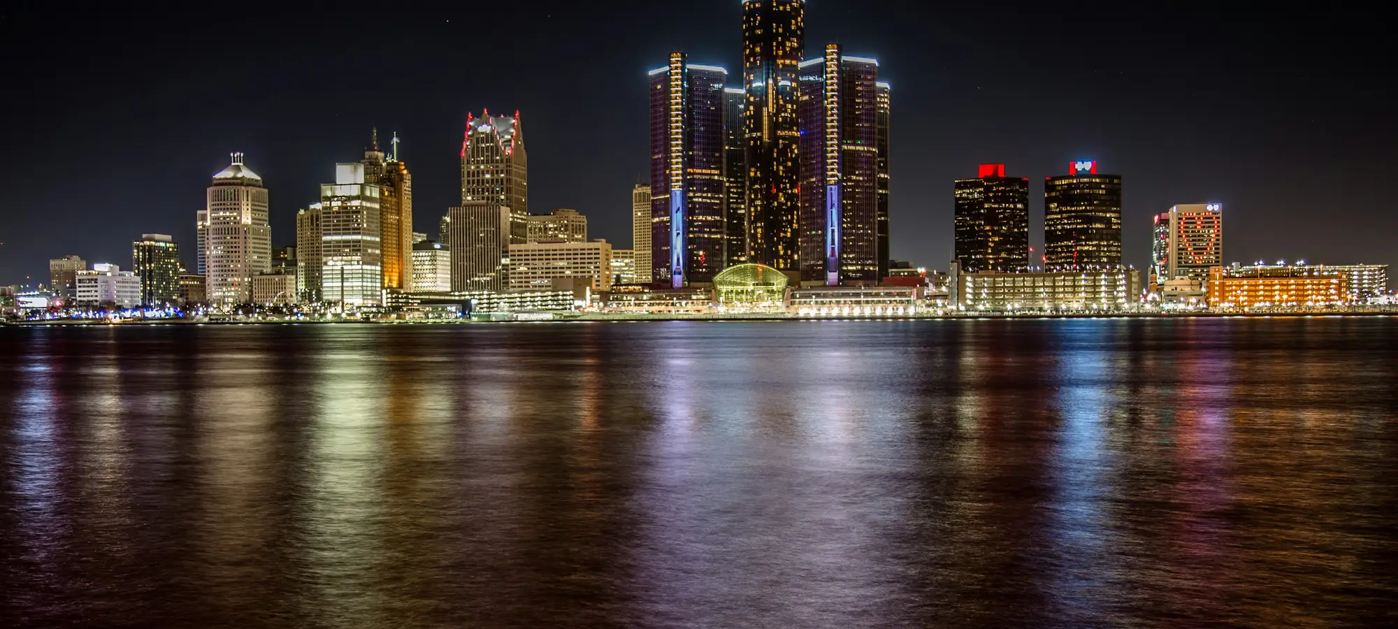 Detroit skyline across the Detroit River at night