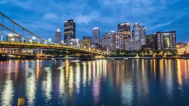Pittsburgh skyline and bridge at dusk