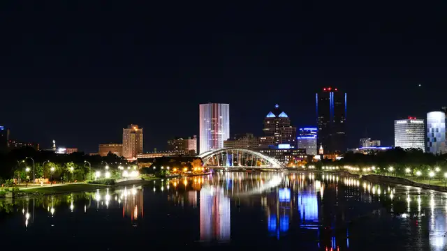 Downtown Rochester, New York, lit up at night along the river