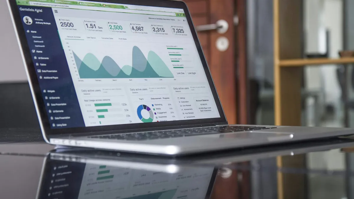 Laptop showing a marketing analytics dashboard