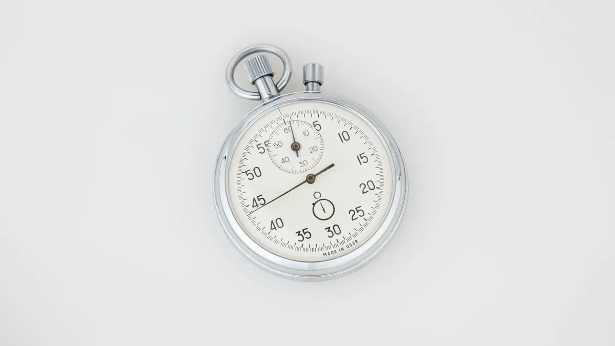 Silver stopwatch on a white background