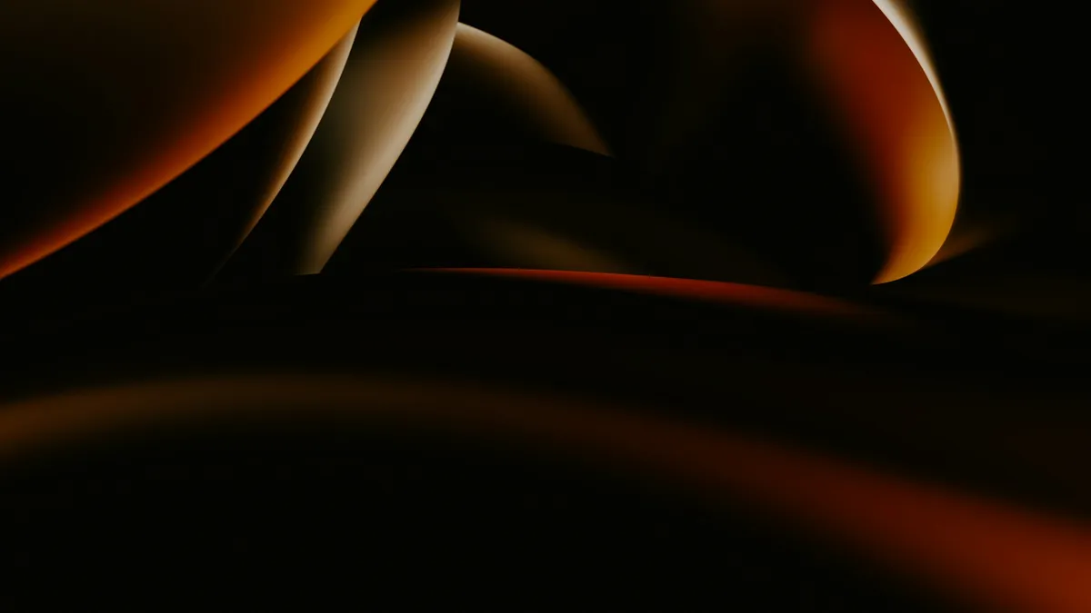 Abstract amber curves on a black background