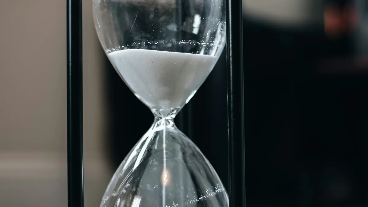 Hourglass with sand running through