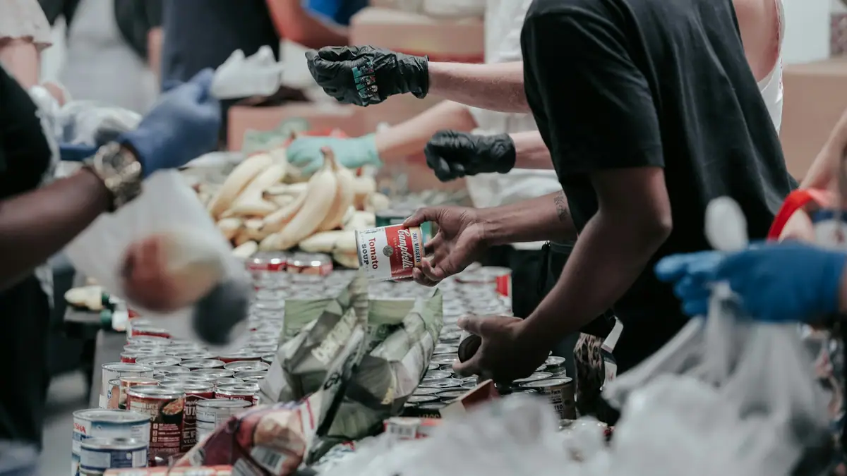 Volunteers sorting food donations