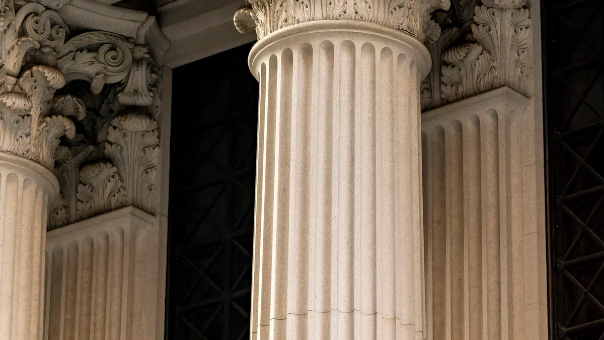 Fluted stone columns on a classical bank facade