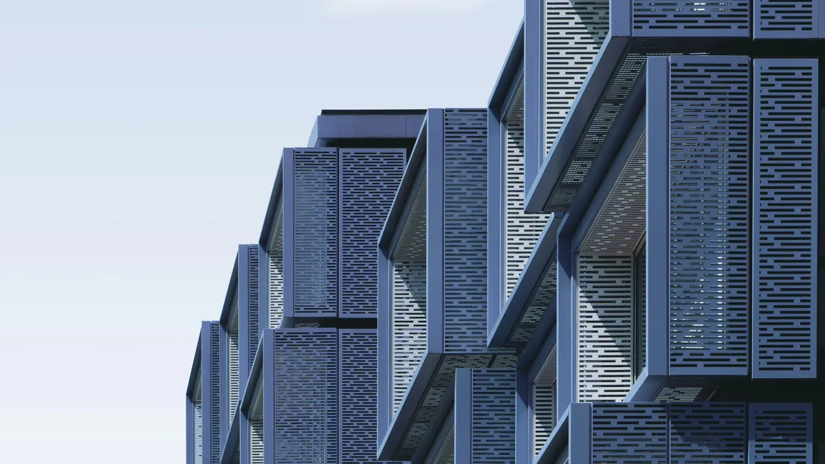 Modular building facade of stacked metal units