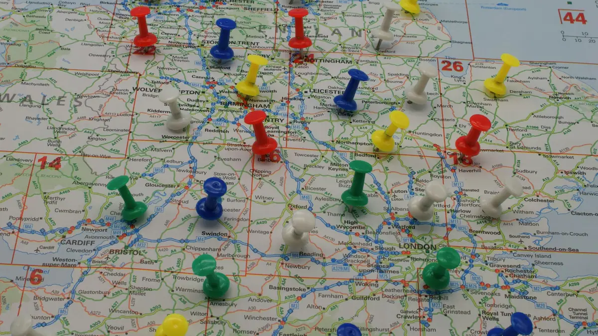 Road map dotted with colored push pins